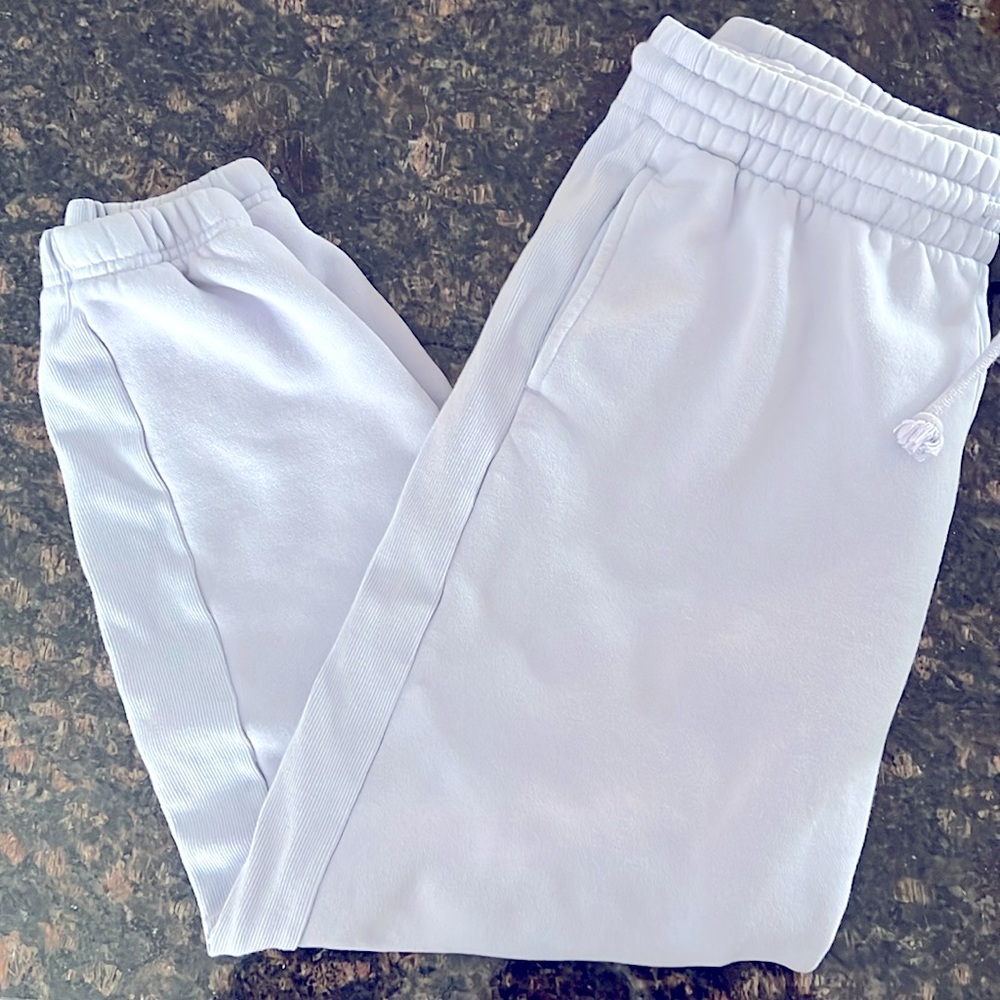 TNA sweat pants light purple size medium